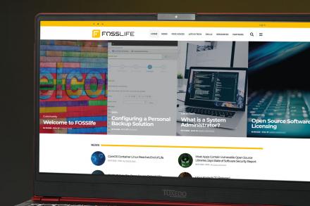 Screenshot of FOSSlife.org shown on a laptop