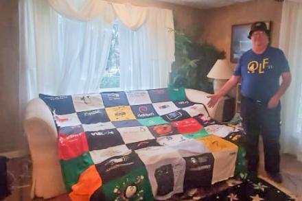 Unique Quilt Displays Linux History for the OLF Conference