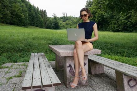 Woman with a Tuxedo laptop